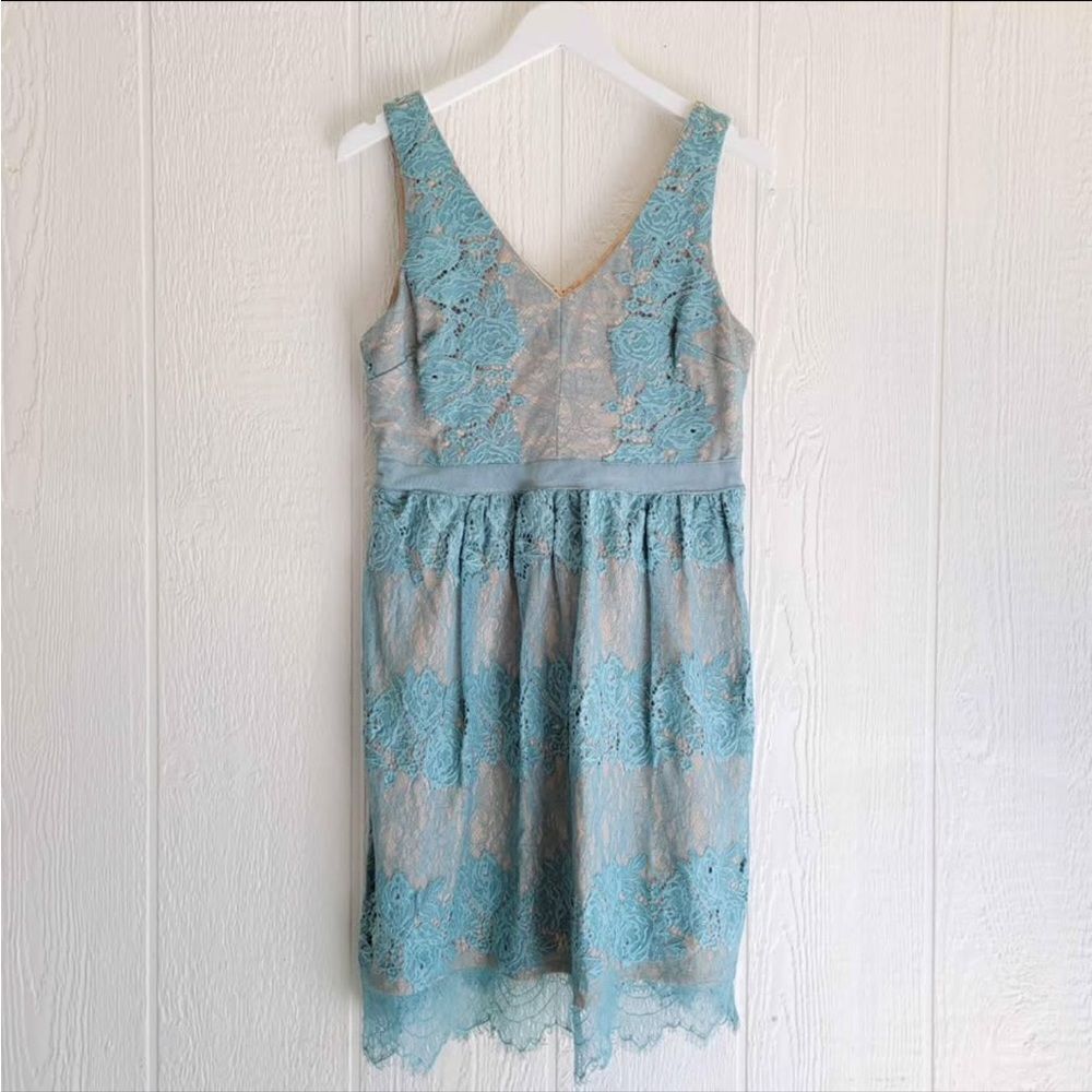 Francesa’s Turquoise lace dresss